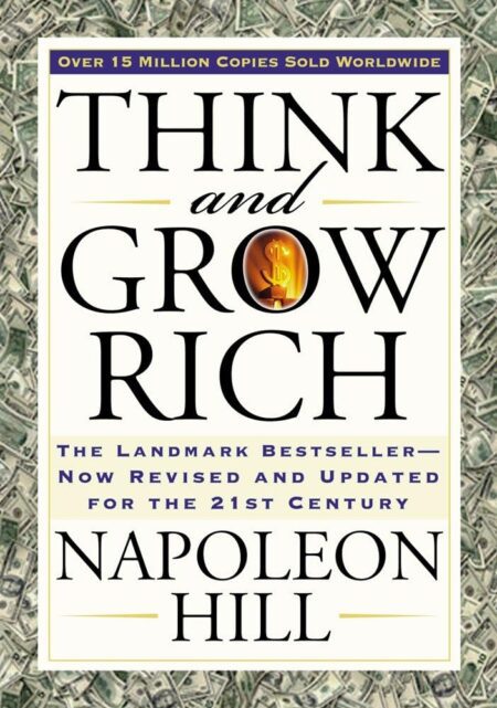 Cover of Think and Grow Rich, featuring bold white text on a red background with a stylized portrait of Napoleon Hill. The title stands out in large letters with the updated subtitle: "The Landmark Bestseller Now Revised and Updated for the 21st Century."